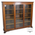 SOLD Antique 1890s Oak Triple Door Bookcase with Angel Heads and Claw Feet