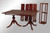 SOLD Mahogany Duncan Phyfe Dining Table w/4 Leaves