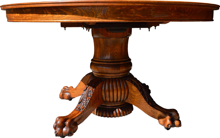SOLD Round Oak 54” Heavily Carved Banquet Table by Hastings – 4 Leaves