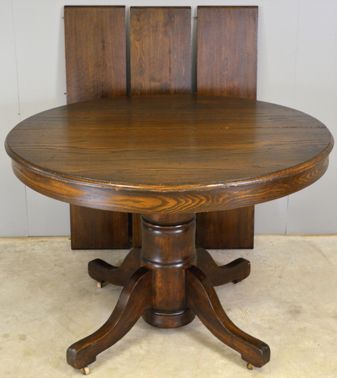 SOLD Round Oak Table with 3 leaves – 1910s