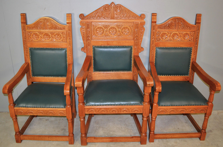 Set of three heavy oak office chairs
