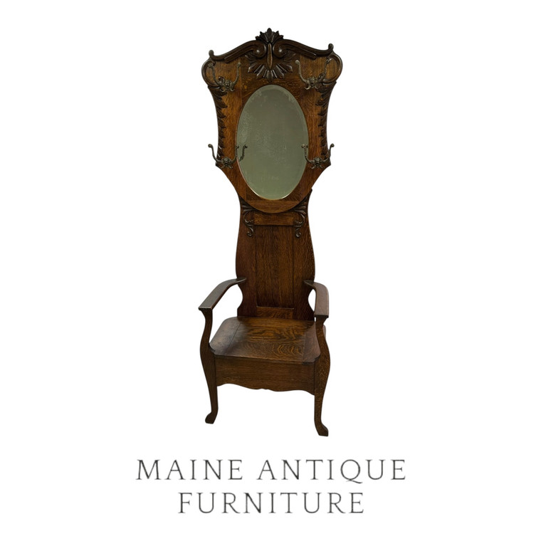 SOLD Victorian Carved Oak Hall Tree with Oval Bevel Mirror & Lift Seat – 1890s