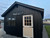 Black board and batten shed Black board and batten shed