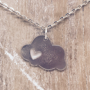 heart in a cloud charm