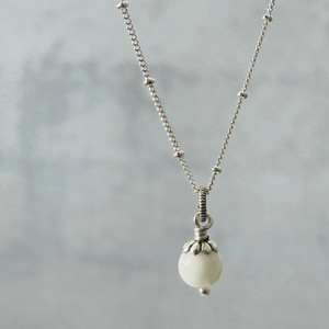 little flower capped pearl little flower capped pearl