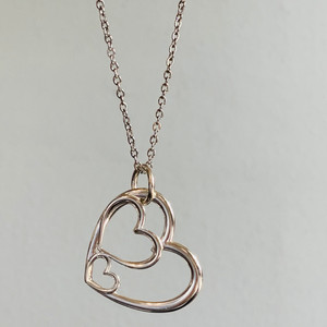 unfilled triple hearts necklace unfilled triple hearts necklace