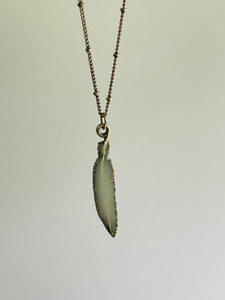 milk feather charm