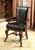 Leather game chair in cherry on casters