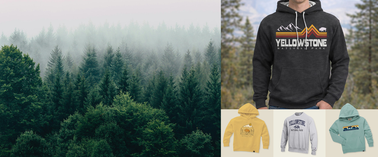 Yellowstone inpired hoodies and sweatshirts layered with a background of trees.
