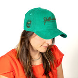 Woman Wearing New Era Yellowstone Script With Moose Hat Green Left Side
