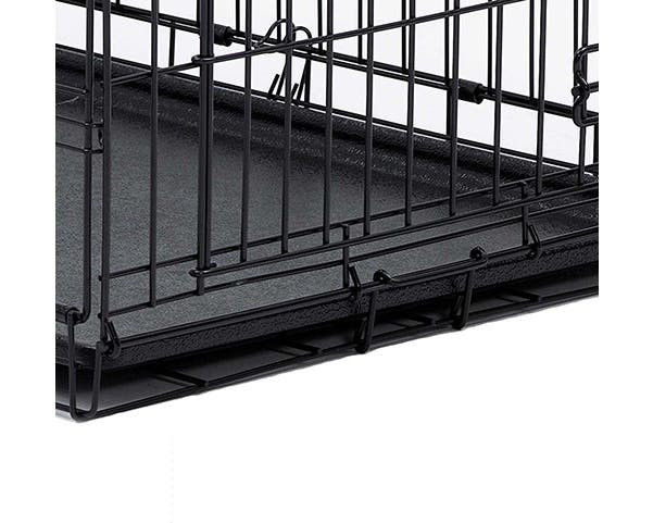 Close up of removable plastic base tray in MidWest Contour dog crate