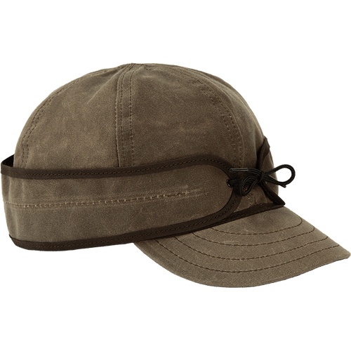 Image of Stormy Kromer Waxed Cotton Cap: a six-panel waxed cotton cool weather cap with a pulldown earband and a tie in the front. Image of Stormy Kromer Waxed Cotton Cap: a six-panel waxed cotton cool weather cap with a pulldown earband and a tie in the front.
