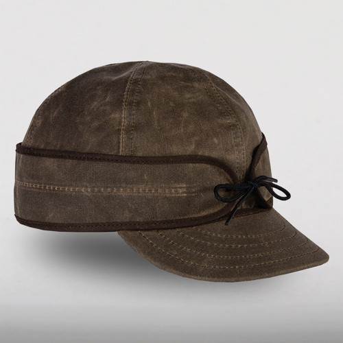 Image of Stormy Kromer Waxed Cotton Cap: a six-panel waxed cotton cool weather cap with a pulldown earband and a tie in the front.