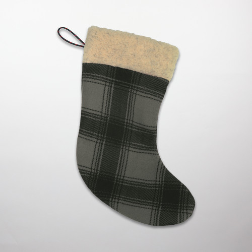 The Fleece Holiday Stocking in black/gray plaid fleece with a cream sherpa collar.
