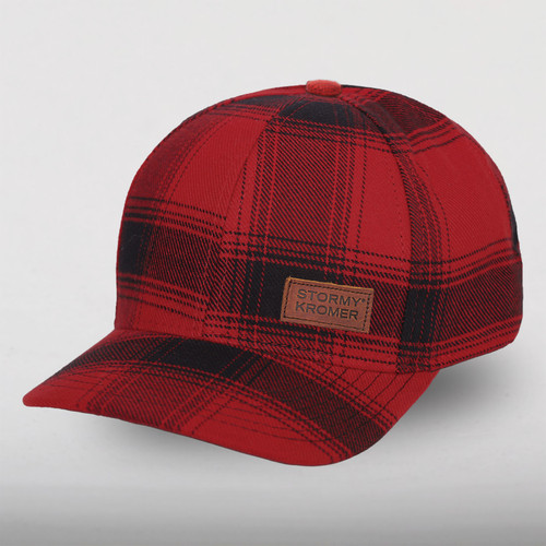 Side view of flannel baseball cap with leather patch on the front.