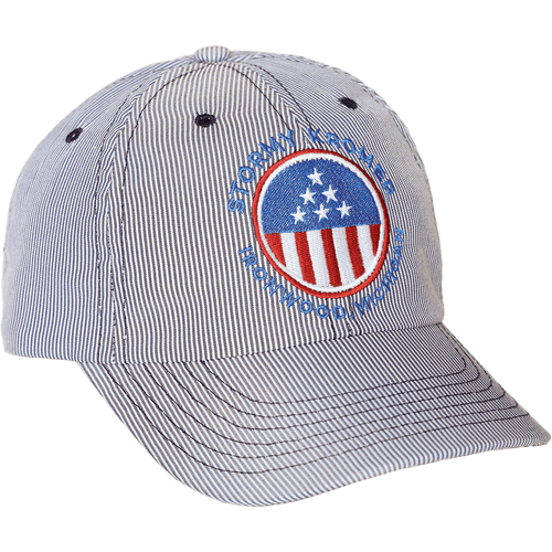 45 degree angle view of The Heritage Ballcap: A traditional baseball style cap made in traditional railroad pincord, and featuring the words Stormy Kromer and a red, white and blue design embroidered on the front.