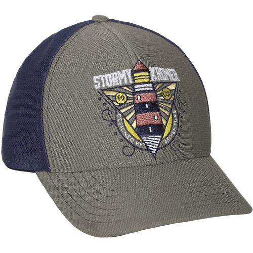 45 degree angle view of The Performance Trucker Cap: A traditional baseball style cap with the front two panels and brim in gray, and the back in navy mesh. Featuring the words Stormy Kromer and a lighthouse embroidered on the front.