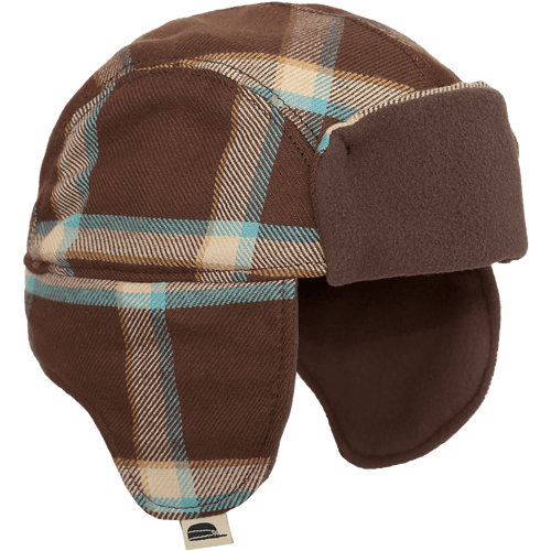 Side view of the Kit Trapper Hat - a kids winter hat made with twill on the outside and a contrasting color fleece inside and on the front. The hat extends down to cover the child's ears.