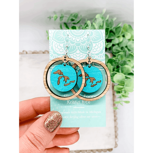 Pair of round earrings with a turquoise round with the Great Lakes surrounded by a light wood, round dangling frame