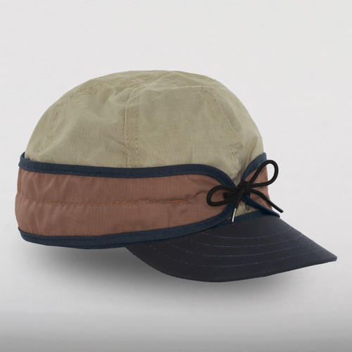 Our Adjustable Trail Cap in the color Stone/Red Clay/Navy.