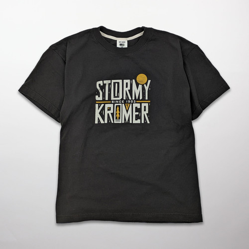 Black short sleeve tee with a printed graphic of Stormy Kromer woodcut
