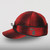 The Stormy Kromer Original Cap State Pride Cap in red/black plaid with the outline of the state of Michigan embroidered on the side.
