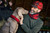 A dog wearing The Furry Friend Shirt Collar in red/black plaid flannel.