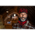 Man wearing The SK Neck Warmer in red/black plaid fleece.