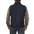 On model back view of the Ironwood Vest: A zip front wool vest with a stand collar and side pockets.