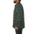 On model side view of the Camp Shirt Jack: A lined, plaid flannel overshirt with snap front, two chest pockets with snap closure and two side pockets.