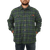 On model front view of the Camp Shirt Jack: A lined, plaid flannel overshirt with snap front, two chest pockets with snap closure and two side pockets. Model has hands in pockets.