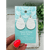 Pair of tear drop shaped earrings made of a leather backed cork which look like white birch bark