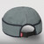 The back of our Adjustable Trail Cap in light blue showing the adjustable strap and clip.
