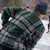 Back of a man wearing a  Frontier Shirt Jack playing hockey