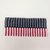 Knit headband with a red, white, and blue American flag design.