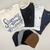 Assorted Stormy Kromer sweatshirt and beanie bundle options, with four sweatshirt designs and navy, gray, black, and brown knit beanies.