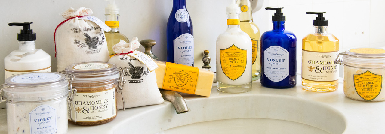 U.S. Apothecary Bath & Body products on bathroom sink