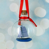 Sailboat with Blue Striped Sails in a Glass Bottle Ornament