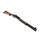 Close-up of MAC 2 shotgun with wood furniture 