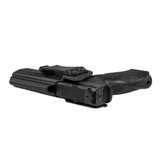 pistol laying on the ground with black concealed carry holster PX-9 GEN3