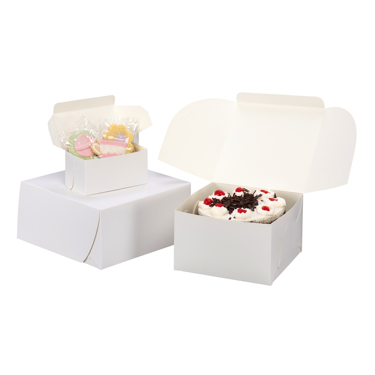 Image des boîtes à pâtisserie blanches