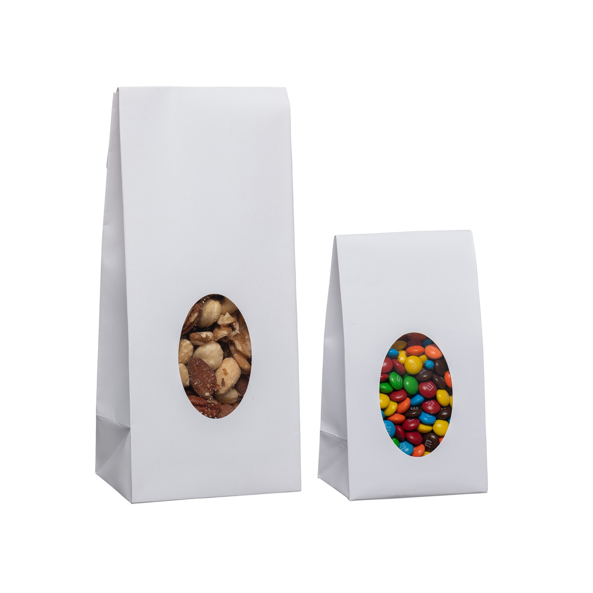 Image des sacs de bonbons blancs sur pied