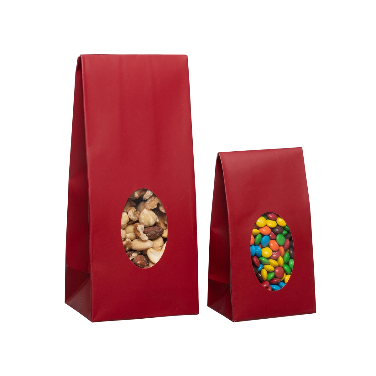 Image des sacs de bonbons rouges sur pied