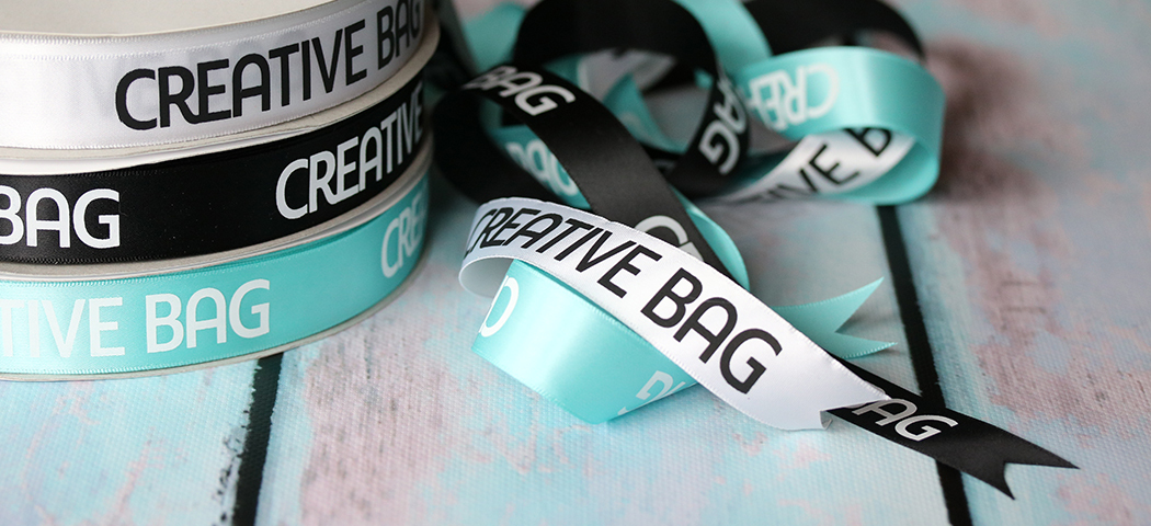 Custom branded ribbon for wholesale packaging and custom packaging in Canada
