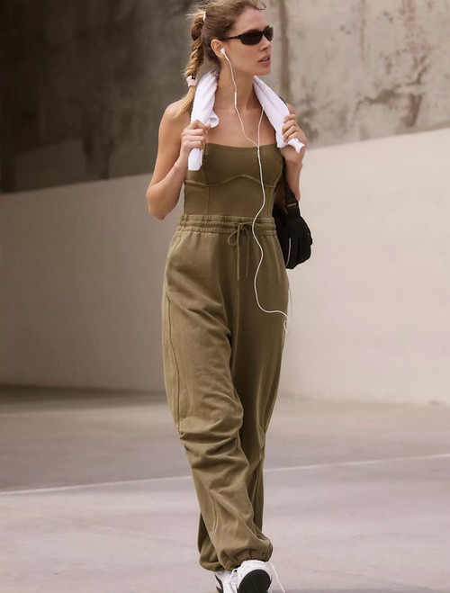 Onesie featuring tie waist band with pull on style. Fitted through the top with a relaxed leg.