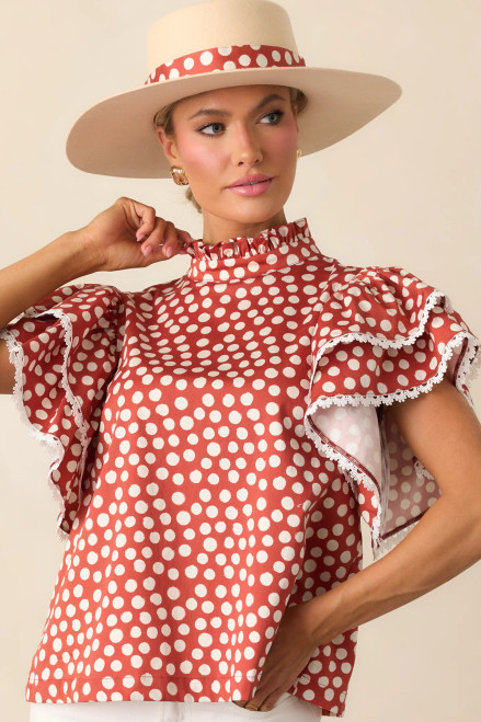 Statement sleeve polka dot top with a timeless pattern and a touch of whimsy.
97% Cotton & 3% Spandex