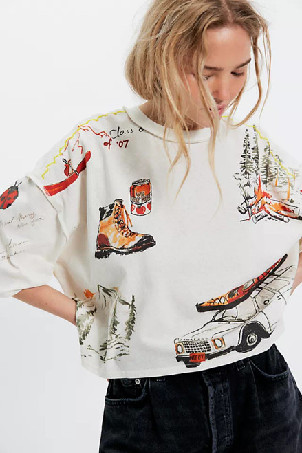Take a hike in this elevated staple tee from our We The Free collection, featuring a lightweight cotton fabrication, a boxy, slightly oversized silhouette, and camp-inspired graphics for a folksy feel.

Short sleeves
Crew neckline
Dropped shoulders
Cropped length
