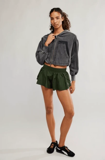 Lightweight, breathable fabrication; sweat-wicking; thick, elastic waistband; low-rise design; shorty silhouette; built-in briefs.