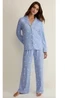 This cozy two-piece set pairs relaxed floral pants with a button-front snuggle top for effortless lounging. The Dawn Floral Pant & Snuggle Top has a soft drape, long sleeves, and a wide-leg pant silhouette perfect for at-home comfort. Z Supply designed the set with an allover small floral print and a notched collar that elevates sleepwear basics. Wear it for slow mornings or relaxed evenings when comfort meets simple, feminine style. Silky Jersey: 95% Polyester 5% Spandex