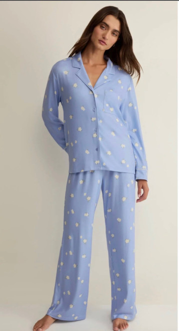 This cozy two-piece set pairs relaxed floral pants with a button-front snuggle top for effortless lounging. The Dawn Floral Pant & Snuggle Top has a soft drape, long sleeves, and a wide-leg pant silhouette perfect for at-home comfort. Z Supply designed the set with an allover small floral print and a notched collar that elevates sleepwear basics. Wear it for slow mornings or relaxed evenings when comfort meets simple, feminine style. Silky Jersey: 95% Polyester 5% Spandex